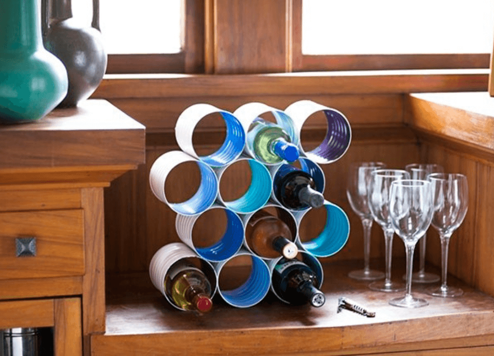 Old Cans Reused Into Wine Holders